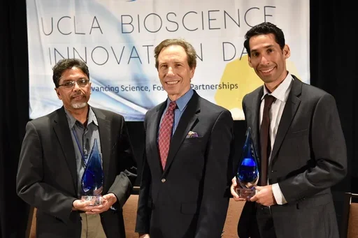 Jesus Campagna and Varghese John presented with the Innovator Award in 2019.